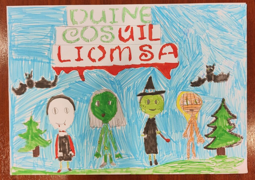 A piece of paper with child's drawing of children and a landscape