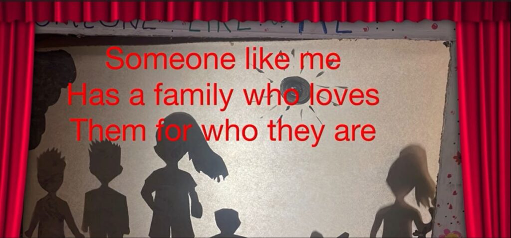 Puppet theather with human silhouettes